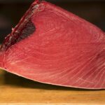 Raw tuna, which will be eaten as sushi.